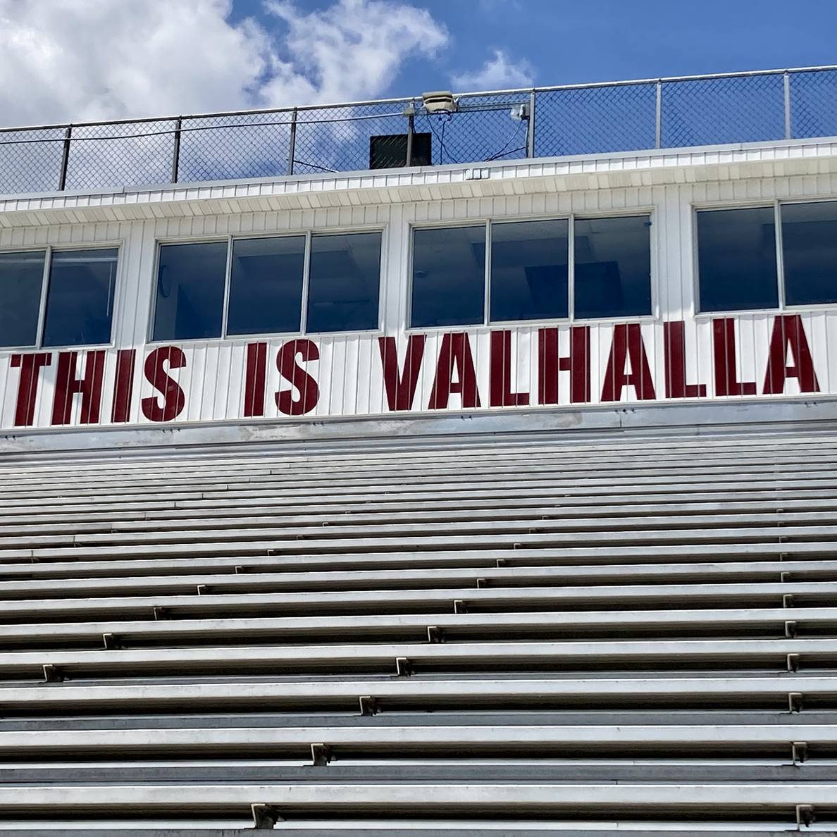 A high school football stadium press box reads “THIS IS VALHALLA”.