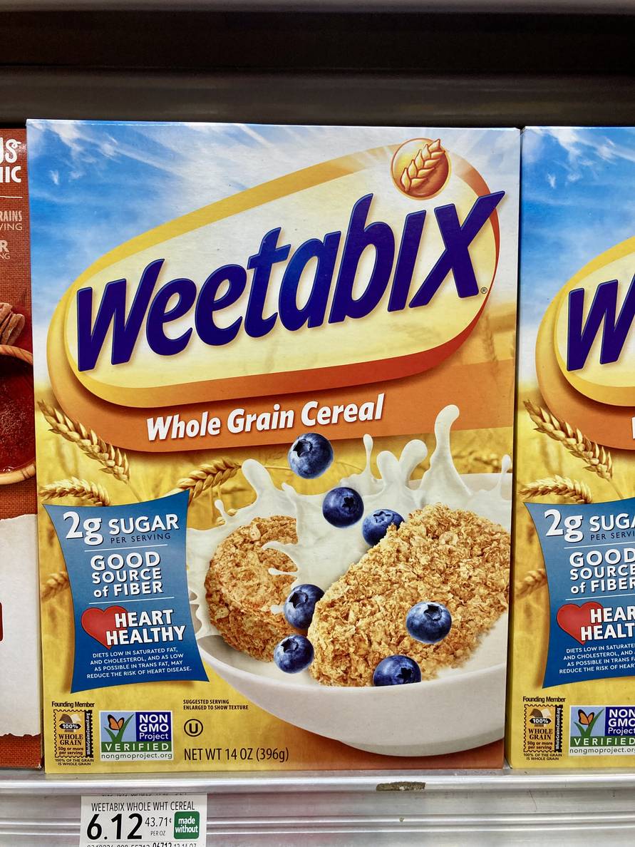 A cereal box of Weetabix “Whole Grain Cereal.”