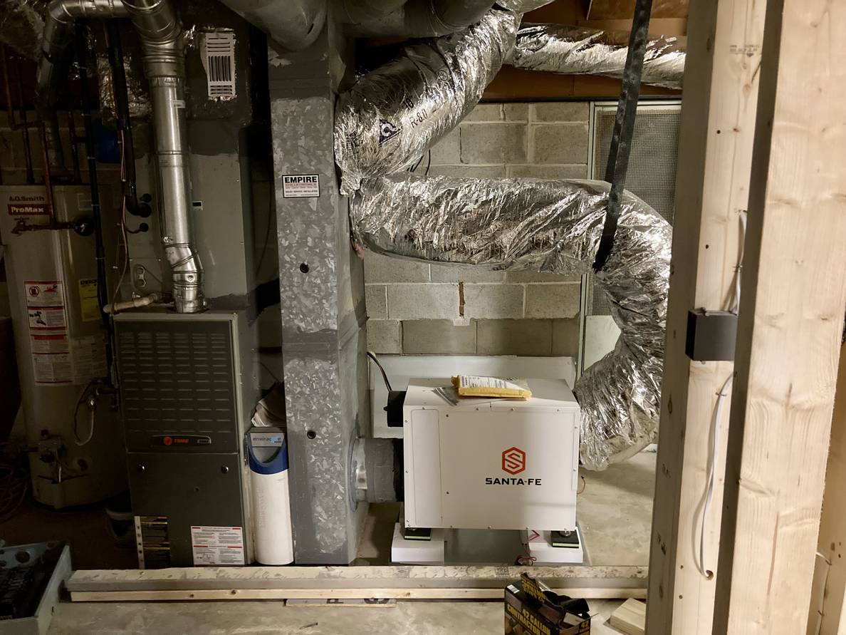 The same utility room looking towards the new dehumidifier.