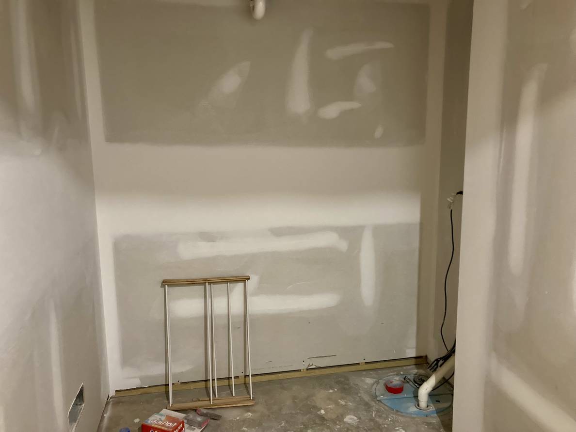 A photo of the partially finished laundry room. Not much is noticeably different from this angle.