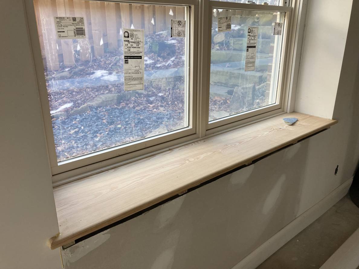 A photo of one of the windows with the newly installed sill.