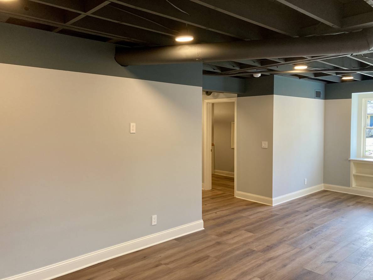 Another after photo from the same second angle. The laundry is now in its own room. The door to it is visible.