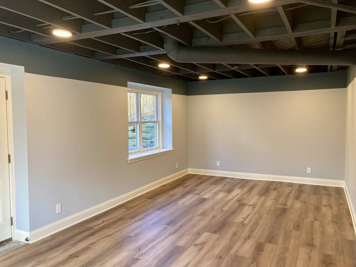 A fourth photo of the main space from a fourth angle. From this angle another window to the side of the house is visible.