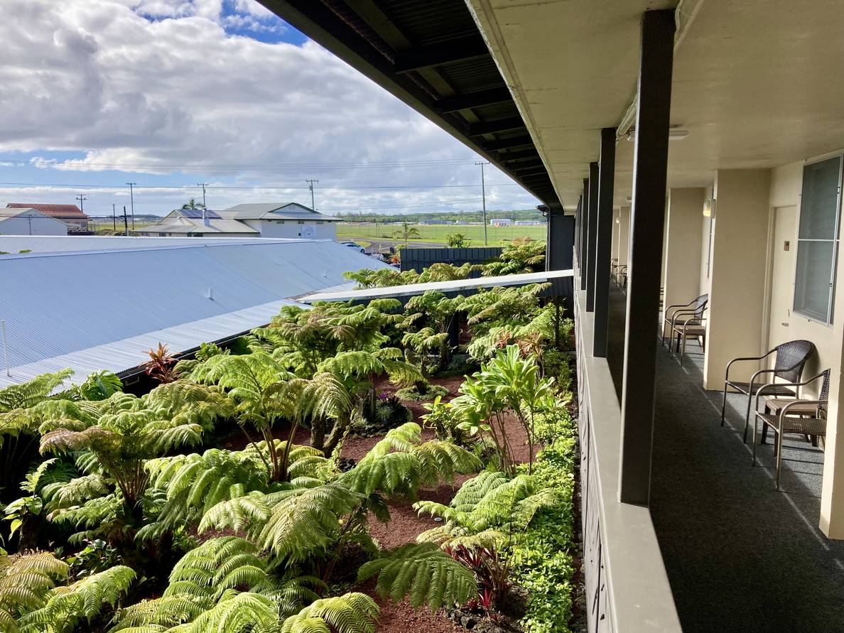 Another photo from our hotel room in Hilo. Compared to yesterday, the sky is not overcast. Instead there are big fluffy clouds and some blue sky.
