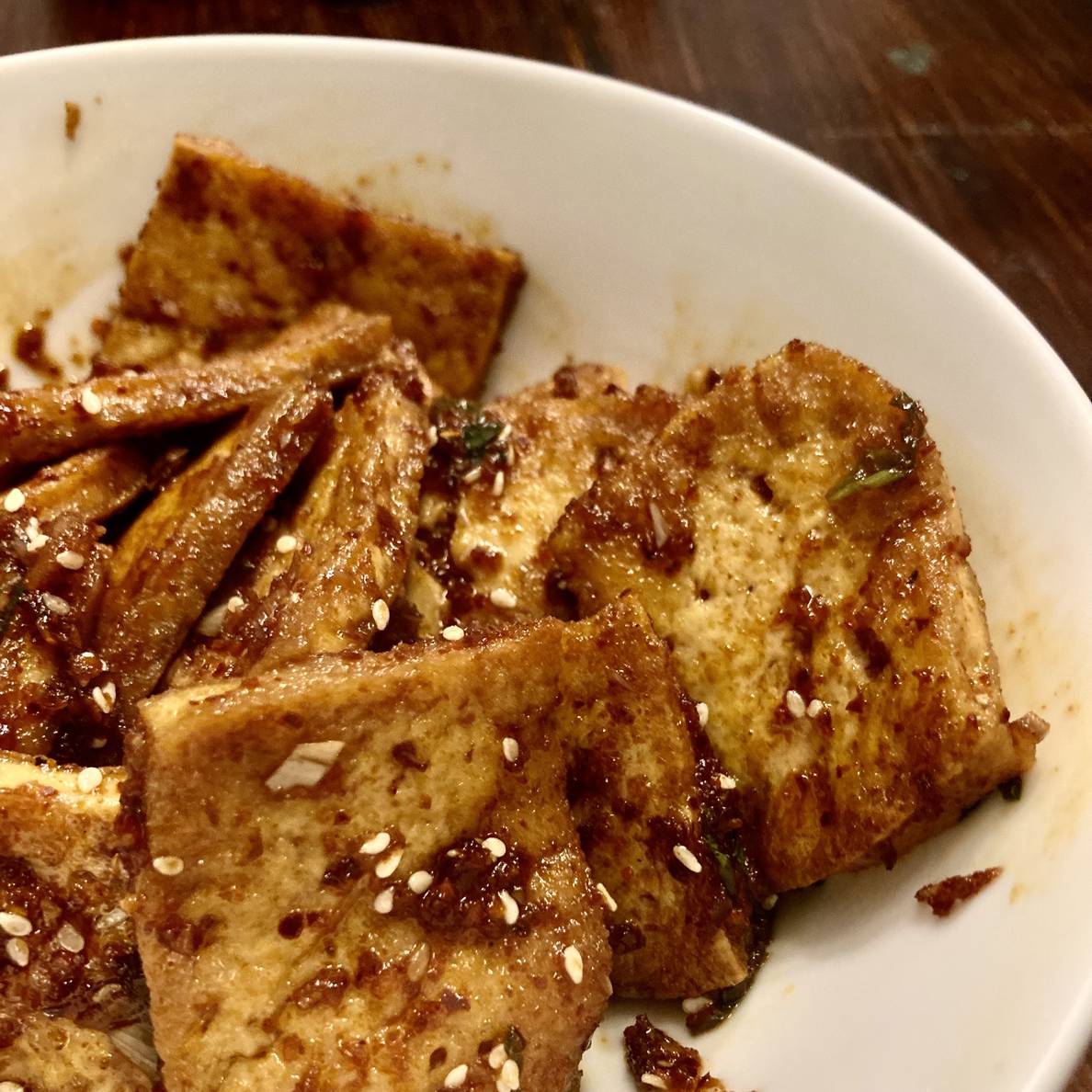A photo of the finished tofu dish in a bowl.